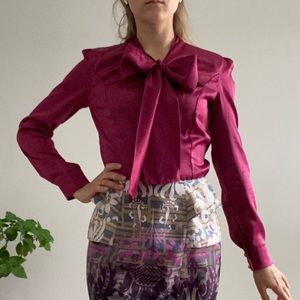 Beautiful blouse. Looks like silk.